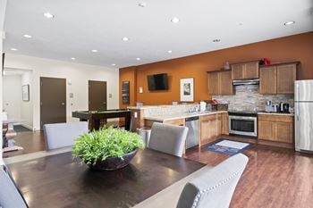 Modern kitchen with a dining table and chairs